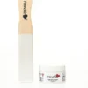 Paintbrush and container of Frenchic Frenshimmer metallic powder for furniture and decor projects, ideal for DIY home decorating.