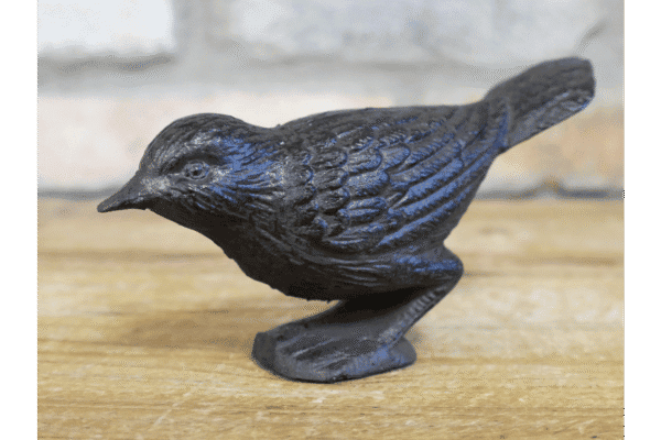 Cast iron bird sculpture with detailed feather texture, black finish, and perched stance, suitable for home decor or garden ornament.