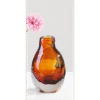 Small amber glass vase with a pink flower, perfect for home decorating and floral arrangements.