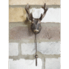 Decorative single stag hook with antler design mounted on a brick wall for home decor.
