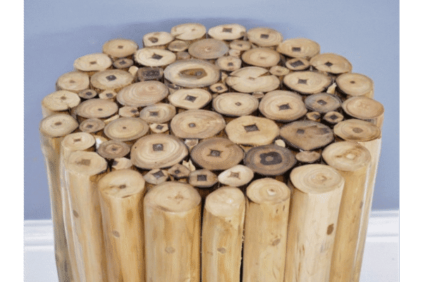 Decorative wooden side table made from vertically arranged natural wood logs with cross-section details.