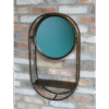 Industrial wall mirror with a black metal frame and a small shelf below, mounted on a brick wall.