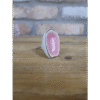 Ceramic pink cabinet knob with a glossy finish, perfect for home decorating projects.