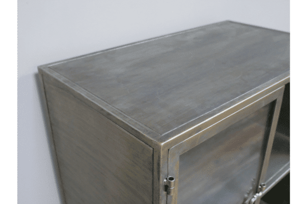 Industrial display cabinet with two glass shelves and metallic finish, ideal for showcasing products in retail or commercial spaces.