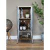 Industrial galvanised and wood shelf unit with decorative items and bottles, ideal for home decorating.