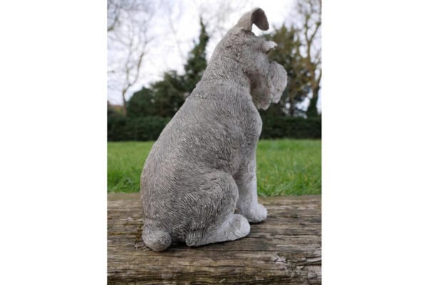 Stringers DIY Schnauser ornament made of stone, detailed sculpture of a sitting dog with textured fur and expressive face.