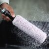 Axus Décor Blue Series Spin & Clean 44mm Core roller cleaning system. Roller sleeve being spun dry.