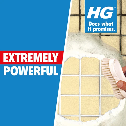 HG Grout Cleaner Spray being used to clean tiled grout lines, highlighting its powerful cleaning capabilities for tiles and grout.