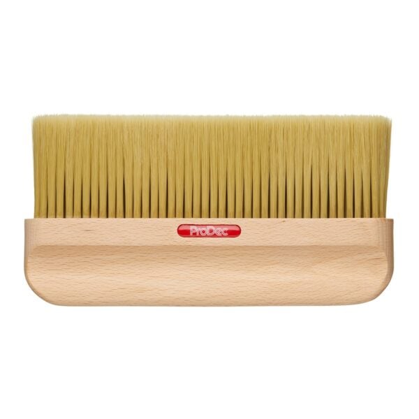 ProDec Wallpaper Hanging Brush 9" unpackaged – ergonomic handle and soft bristles for smooth wallpaper application.