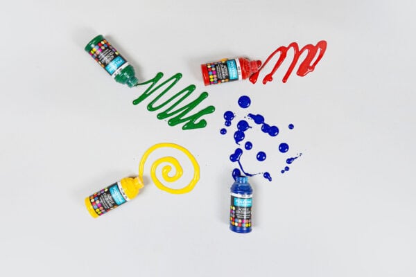 Polyvine Acrylic Colourants in red, green, blue, and yellow with poured paint patterns, designed for tinting Polyvine clear varnishes.