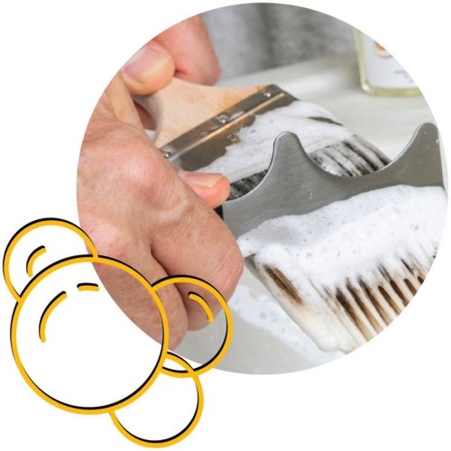 Cleaning paint brush with foam using Pretty Boy paint cleaner.