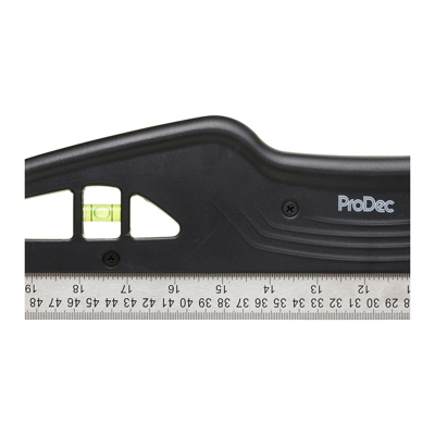 Close-up of ProDec Trimming Edge & Level 600mm tool showing built-in bubble level and measurement scale for precise trimming and leveling tasks.